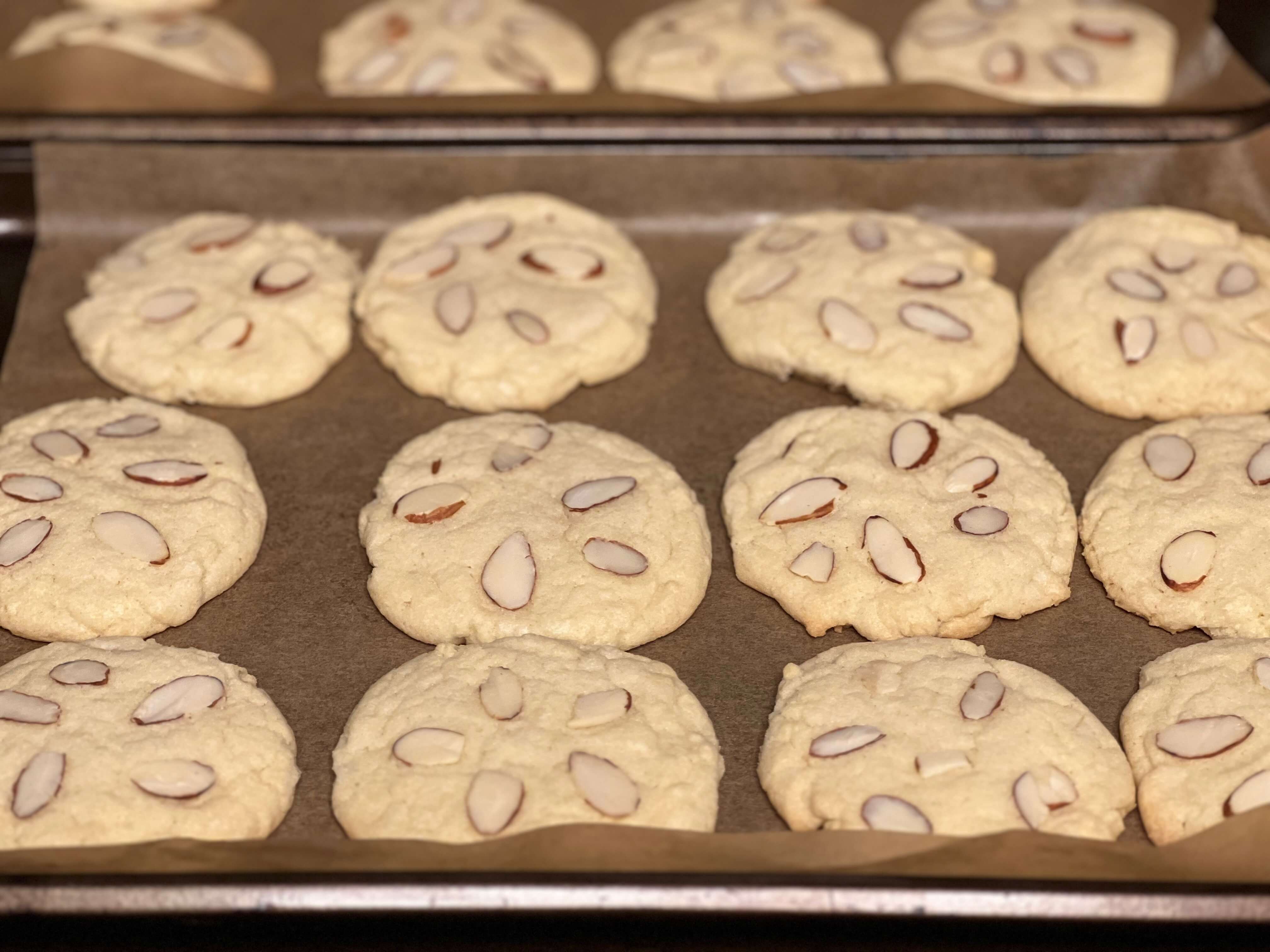 Bake slivered almond cookies at 350 degrees for 11-13 minutes.