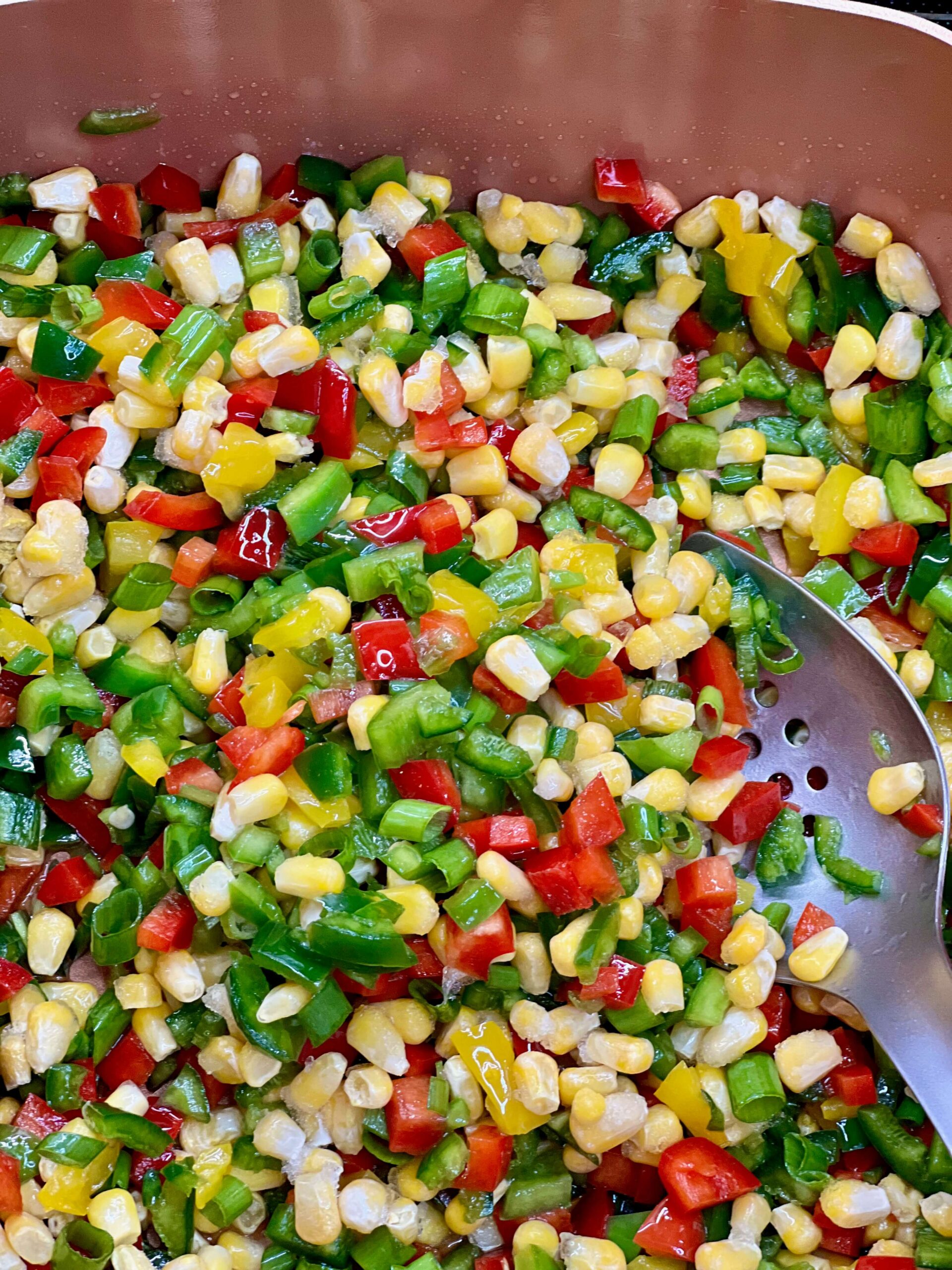 Saute the peppers, corn and onion