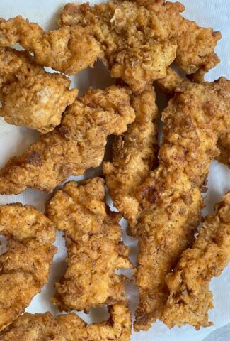 A platter of crispy chicken tenders